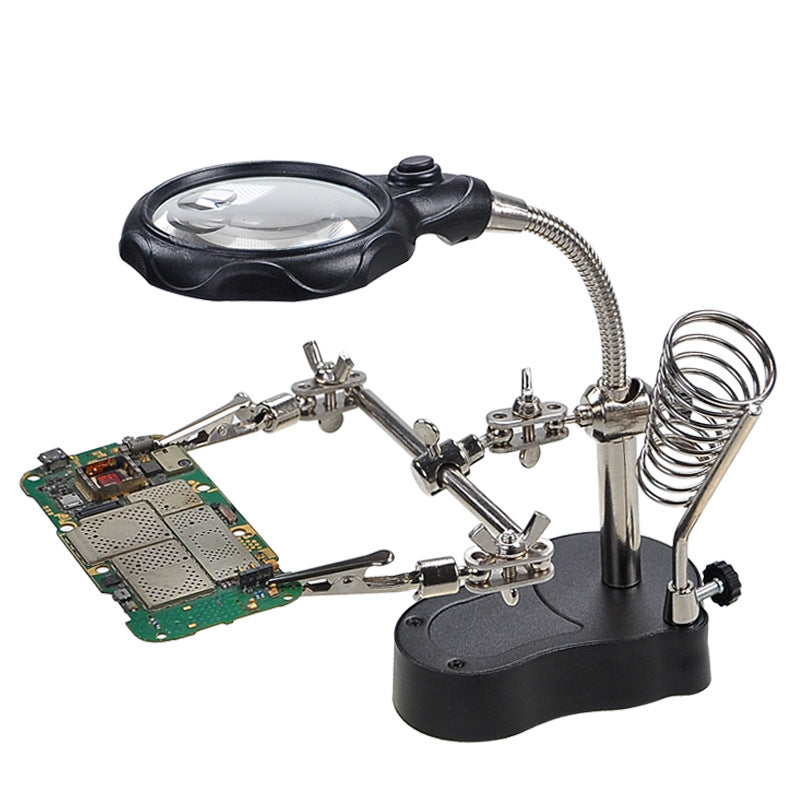 Soldering aid with magnifying glass and LED light stand
